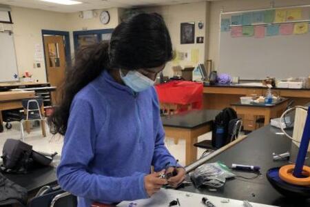 Anaya making prongs for the gripper.